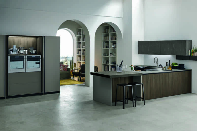 Modern kitchen with arched doorway