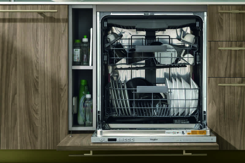 Open dishwasher with dishes inside