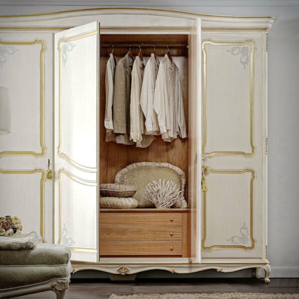 Open wardrobe with hanging clothes