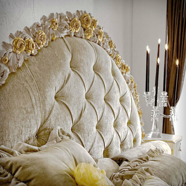 Ornate bed with candles